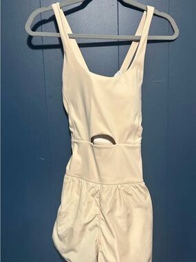 Cream Sleeveless Romper with Front Cutout